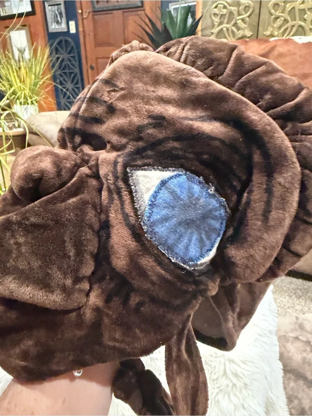 ET. Brown Plush Novelty Accent Pillow with Blue Eye